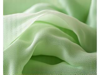 Des fibres textiles naturelles et recyclées entremêlées, symbolisant l'économie circulaire et l'innovation durable